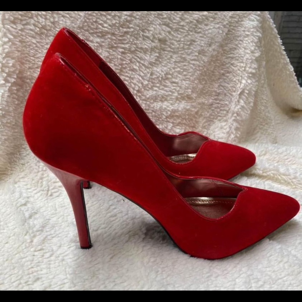 New with box. Red high heels.